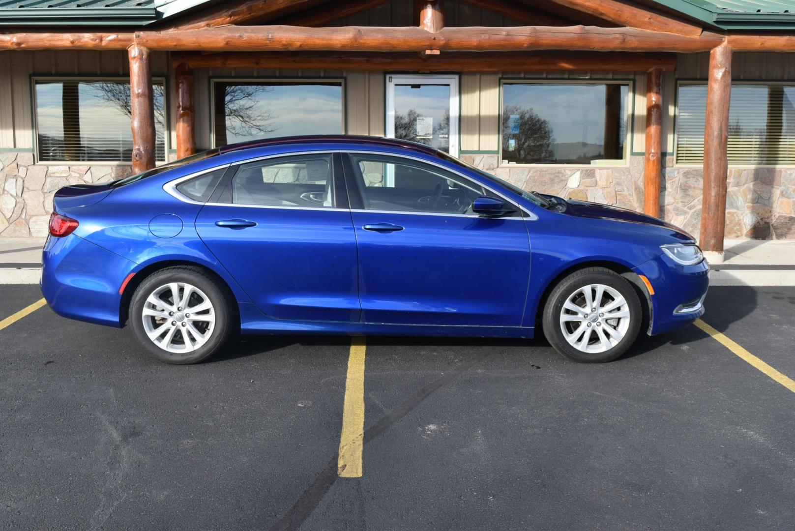 2016 Blue /Beige Chrysler 200 Limited (1C3CCCABXGN) with an 2.4L 4 Cyl Multiair engine, 9-Speed Automatic transmission, located at 1600 E Hwy 44, Rapid City, SD, 57703, (605) 716-7878, 44.070232, -103.171410 - Photo#4